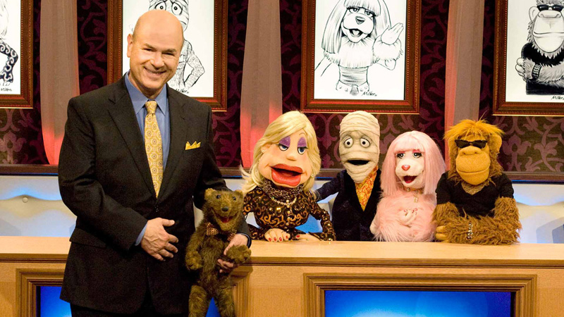 Larry Miller with the puppet cast